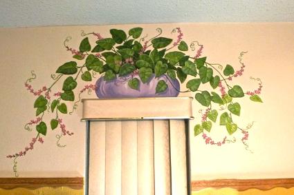Floral design painted above a window by Mural Mural On The Wall, Inc.