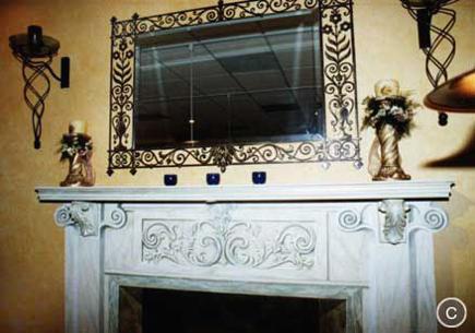 Faux Wrought Iron mirror frame and fireplace by Mural Mural On The Wall, Inc.