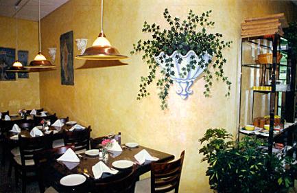 Faux planter painted on the wall of a restaurant by Mural Mural On The Wall, Inc.
