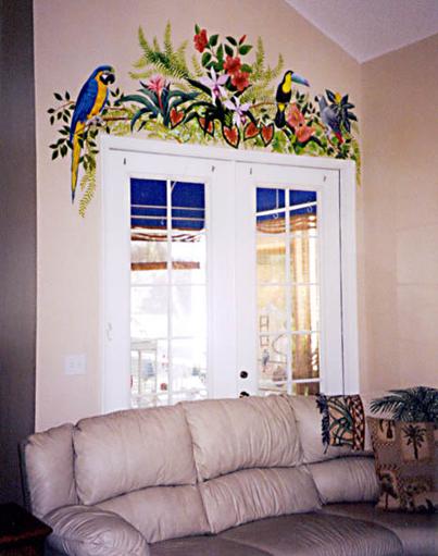 Tropical birds and flowers painted above a doorway by Mural Mural On The Wall, Inc.